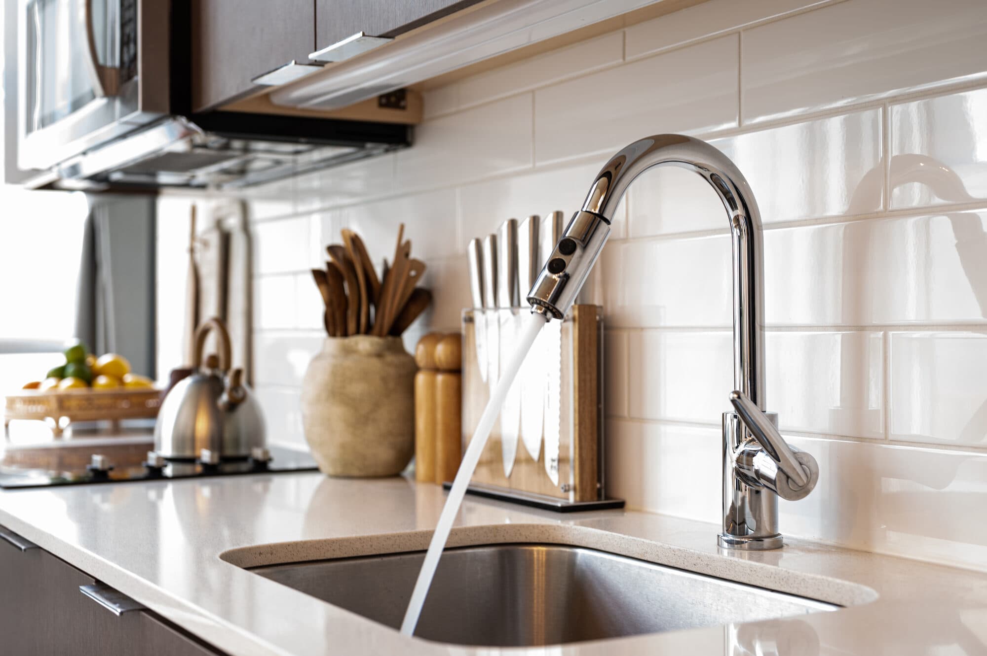 Filtered water running from a kitchen tap